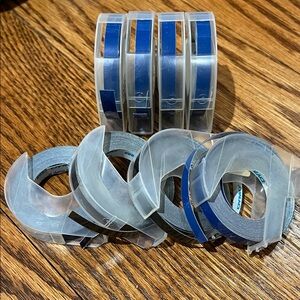 Blue and black Dymo Embossing Label Tape Rolls x 8